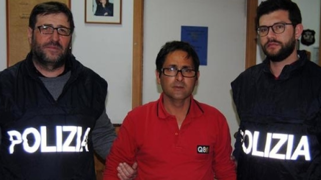 L'arresto di Giuseppe Pecoraro che inchiodato dagli inquirenti ha confessato di aver bruciato vivo un clochard a Palermo. Foto: Ansa.
