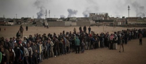 Civiles desplazados de la ciudad de Mosul.