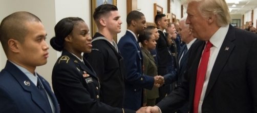 President Trump shakes the hands of service members on January 30 / Daniel Yeadon, Flickr CC BY-SA 1.0 Public Domain