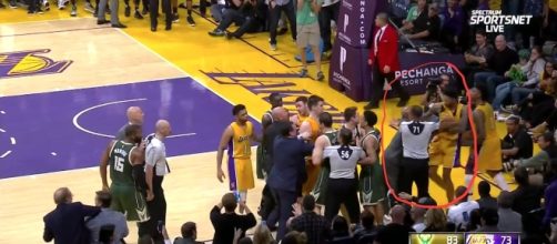 Brandon Ingram of L.A. pushed in a scuffle by a Milwaukee Bucks employee Photo credit: Mark Medina (MarkG_Medina) Twitter