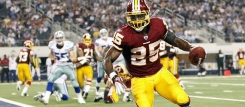 Redskins running back Tim Hightower runs for a TD against the Dallas Cowboys picture via redskins.com