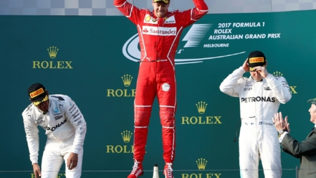 F1: La Ferrari di Sebastian Vettel sul gradino pi&ugrave; alto del podio. ABS-CBN News - abs-cbn.com