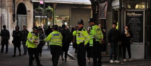 Police officers outside the station - Source: xposurephotos.com