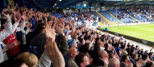 Behind the goal, the traditional place for noies to be made at club football matches - neontommy.com