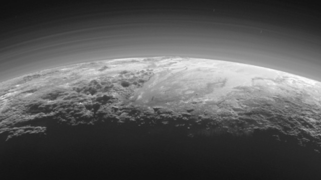Pluto is covered with a lot of water ice - CNN.com - cnn.com