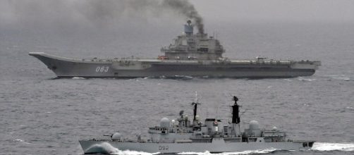 David Vs Goliath of the water: British warship is dwarfed by ... - dailymail.co.uk