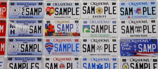 Officials unveil new Oklahoma license plate with state bird design. Photo courtesy of Tulsa World &ndash; tulsaworld.com
