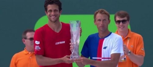 Kubot/Melo win Miami Open doubles trophy, Youtube, ATP World Tour channel https://www.youtube.com/watch?v=ed48Yve4oBk