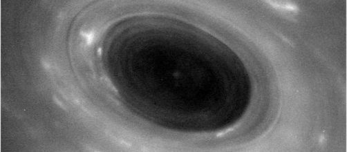 The image is of Saturn's Pole and the hurricane there, NASA