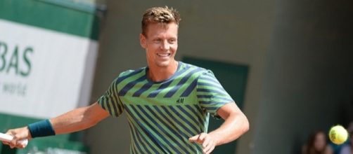 Tomas Berdych hits a forehand shot. Photo by Tatiana -- CC BY-SA 2.0