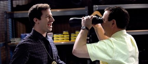 Jake and Boyle rummage to find the "boy toys" they'll use on their stakeout. (via SpoilerTV)