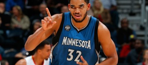 Karl Anthony Towns and the Wolves try to deliver another loss to the Warriors on ESPN. [Image via Blasting News image library/inquisitr.com]