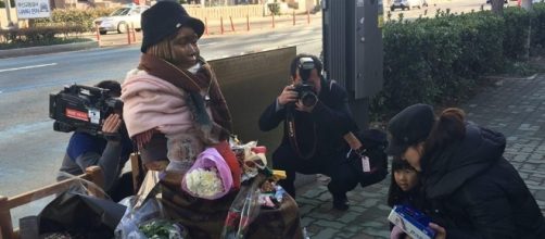 The statue of Japanese military sexual slavery in front of the Japanese consulate in Busan, South Korea. (source:Youth Make Peace)