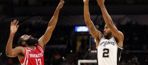 James Harden and the Rockets try to stop Kawhi Leonard and the Spurs in Game 6. [Image via Blasting News image library/twitter.com]