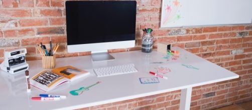 The Whiteboard Deskshield fosters increased creativity and health. / Photo via Danni Kosturko, Small Girls PR. Used with permission.