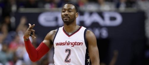 John Wall nailed a huge three with 3.5 seconds left to put Washington ahead for good. [Image via Blasting News image library/slamonline.com]