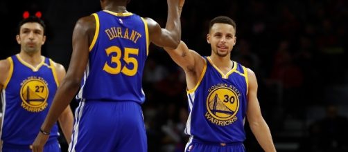 Durant, Curry and the Warriors will try to go up 2-0 in their series on Tuesday night. [Image via Blasting News image library/inquisitr.com]