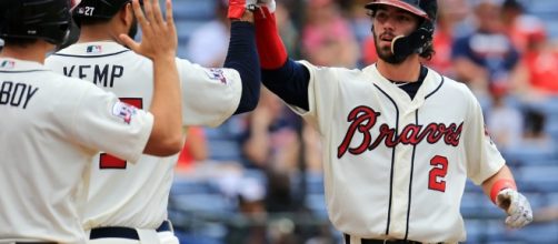ATLANTA, GA - SEPTEMBER 18: Dansby Swanson #2 celebrates scoring ... - pinterest.com