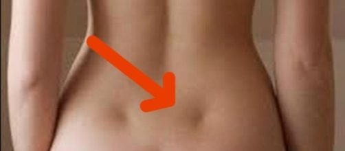 Saiba o que significa essas duas &ldquo;covinhas&rdquo; nas suas costas