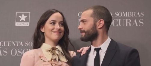 Jamie Dornan and Dakota Johnson are reportedly enjoying their love scenes together. Photo by always shiplove/YouTube Screenshot