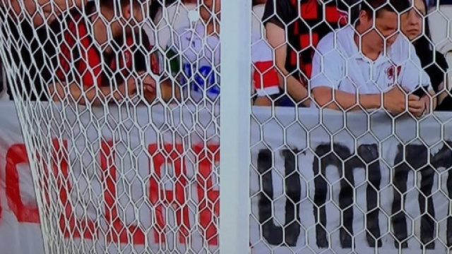 Lo striscione contro Donnarumma apparso a Cracovia