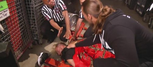 Big Cass checks on his tag team partner Enzo backstage on 'Monday Night Raw.' [Image via Blasting News image library/inquisitr.com]