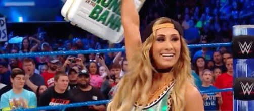 Carmella won the women's 'MITB' ladder match at 'Money in the Bank,' or so she thought. [Image via WWE/YouTube]