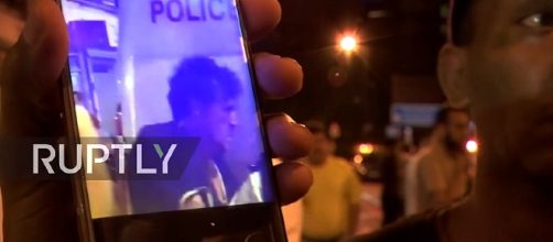 Photo van driver as he is arrested screen capture from YouTube video / RT News