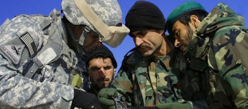 Afghan soldiers are given woodland camouflage for desert warfare - Wikimedia Commons - wikimedia.org