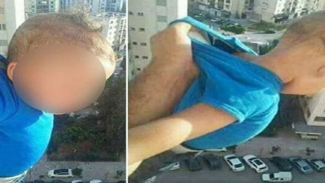 Il bambino appeso fuori dalla finestra