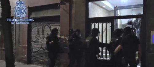 Photo Spain's National Police arrest 3 terror suspects in Madrid photo capture from YouTube/Polic&iacute;a