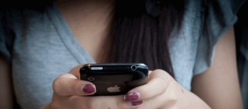 Texting - by Jhaymesisviphotography via Flickr