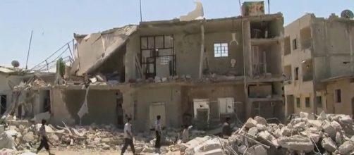Syria during the Syrian civil war. 16 August 2012, Azaz residents pick up after aerial bombings - wikipedia.org