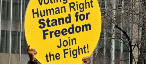 Occupy Wall Street joined the NAACP as thousands marched in midtown Manhattan on December 10, 2011 to defend voting rights by Michael Fleshman