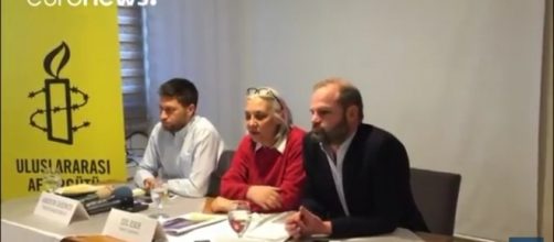 Members of Amnesty International Turkey. / [Image screenshot from Euronews via YouTube:https://youtu.be/T26Q_As7rYM]