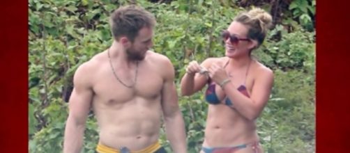 Hilary Duff spends romantic walk with a new man on the beach. Image via YouTube/TMZ