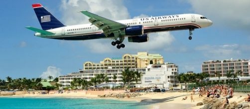 Photo Princess Juliana International Airport via Wikimedia by Lawrence Lansing/CC BY-3.0