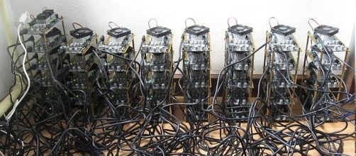 Bitcoin mining credits:wikipedia https://en.wikipedia.org/wiki/Canaan_Creative#/media/File:Icarus_Bitcoin_Mining_rig.jpg