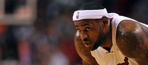 Heat star LeBron James firing a belt-fed machine gun and ... - fansided.com