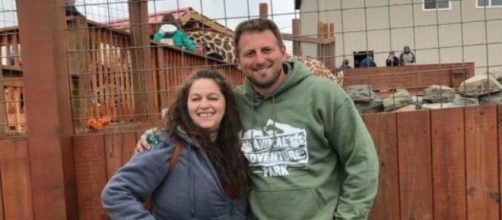Kelly Bain strikes a pose with Jordan Patch, the owner of Animal Adventure Park. [Image credit: Kelly Bain]