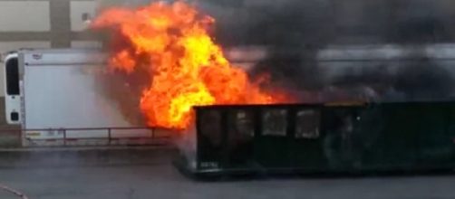 A dumpster fire in Brighton. / [Image Andy Dickason | YouTube]