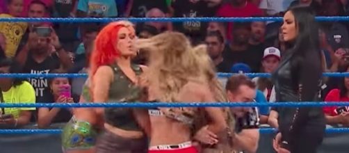 As of Sunday, a new No. 1 contender will be determined for the 'SmackDown' Women's title at WWE "SummerSlam" 2017. [Image via WWE/YouTube]