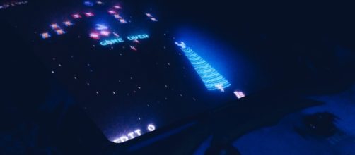 Gameplay, source https://www.pexels.com/photo/classic-galaga-games-72949/