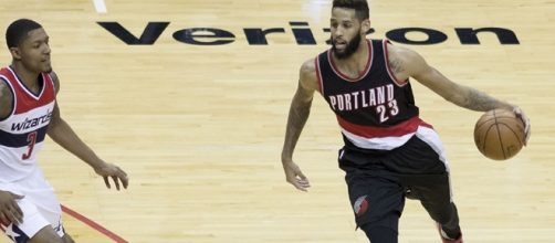 Bradley Beal vs Allen Crabbe/ photo by Keith Allison via Flickr