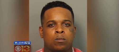 Finese2Tymes, born Ricky Hampton, as seen in a mugshot - YouTube/CBS Baltimore