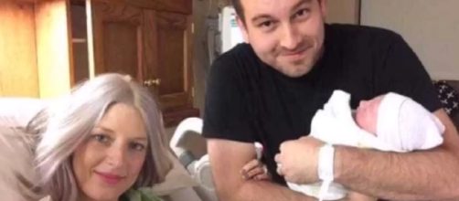 Megan Johnson poses for a photo with her husband and daughter hours before she died - YouTube/mini cash