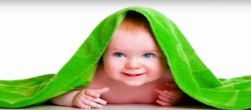 Baby under a blanket (Image Source: YouTube/Jason Stephenson - Sleep Meditation Music)