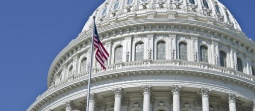 Rotunda/flag at U.S. Capitol in Washington, D.C. / [Image by Tim Evanson via Flickr, CC BY-SA 2.0