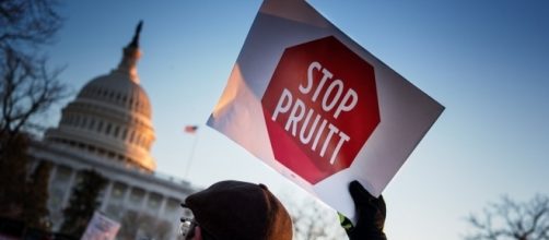 Protester at rally to oppose Scott Pruitt nomination / [Image by Lorie Shaull via Flickr, CC BY-SA 2.0]