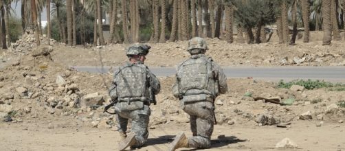 Two US soldiers in operation in Iraq.Photo pixabay.com/en/soldiers-iraq-camouflage-military-766355/